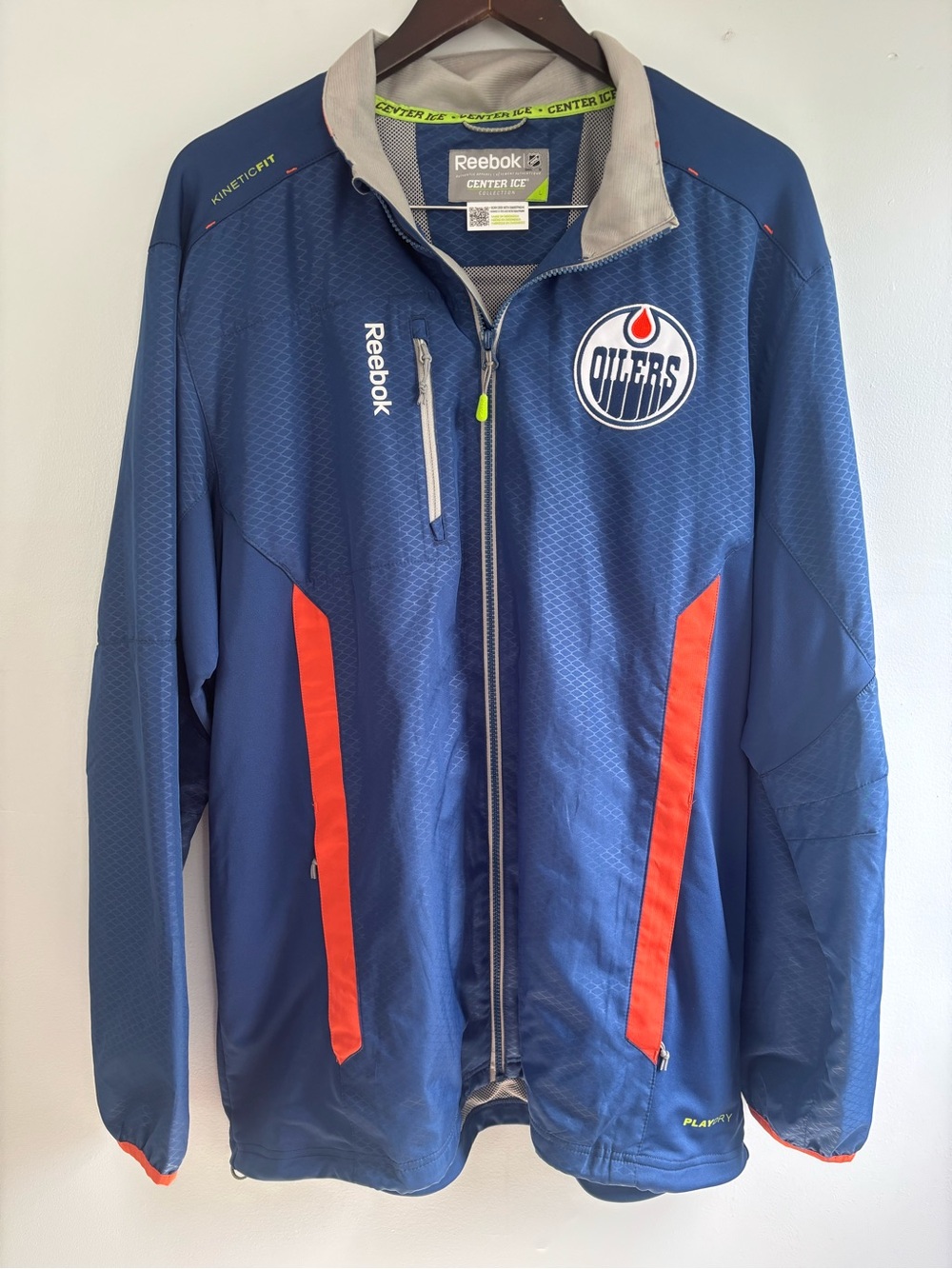 Reebok Men’s Navy Performance Jacket with Orange Accents